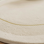 Tapis crème forme irrégulière pour salon élégant