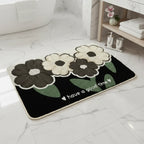Tapis de bain antidérapant fleurs noir - Confort et sécurité pour votre salle de bain