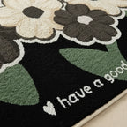 Tapis de bain antidérapant fleurs noir - Confort et sécurité pour votre salle de bain