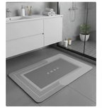 Tapis de bain séchage rapide gris pour une salle de bain