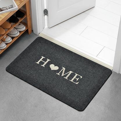Tapis d'entrée confortable maison cœur