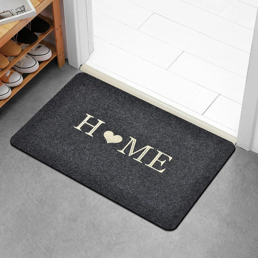 Tapis d'entrée confortable maison cœur